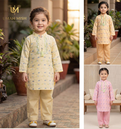 Girl wearing pastel yellow lawn jacquard kurta and trouser set with embroidered neckline.